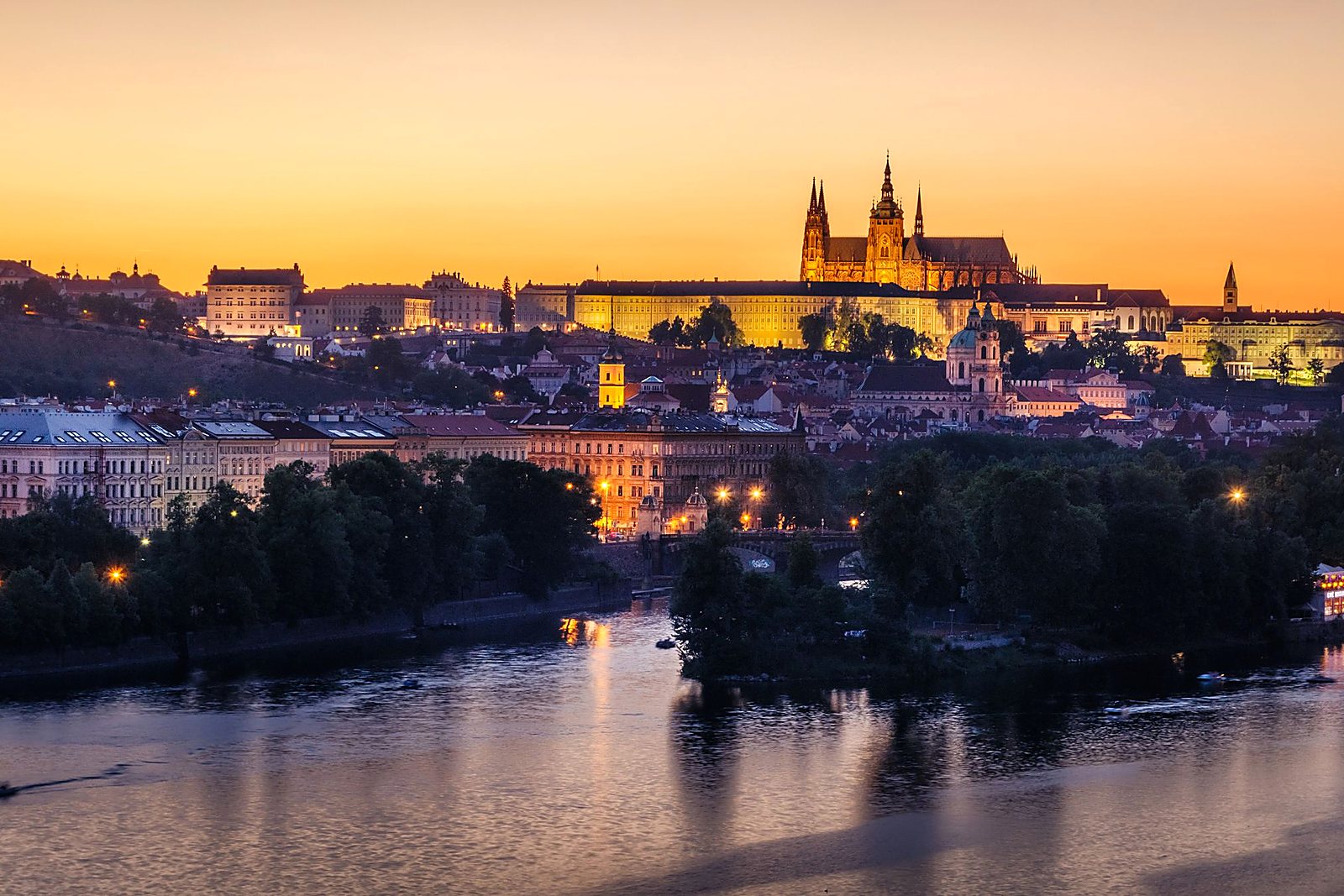 Prague Castle above the Vltava at dusk